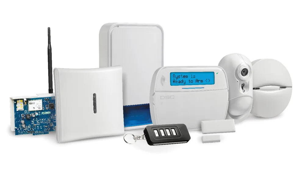 Panel de alarma DSC con teclado, sensores de movimiento, contactos magnéticos y control remoto